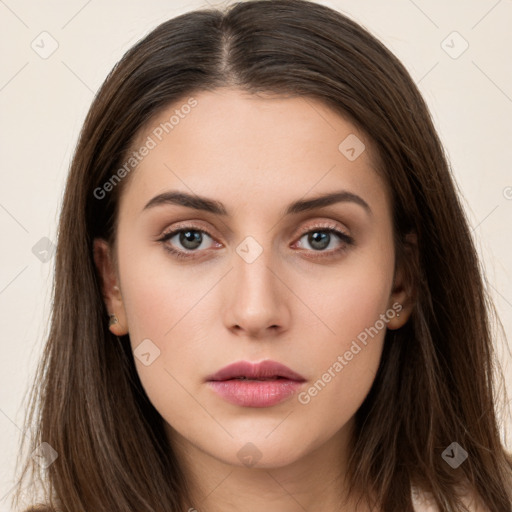 Neutral white young-adult female with long  brown hair and brown eyes