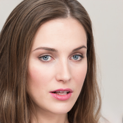 Neutral white young-adult female with long  brown hair and grey eyes