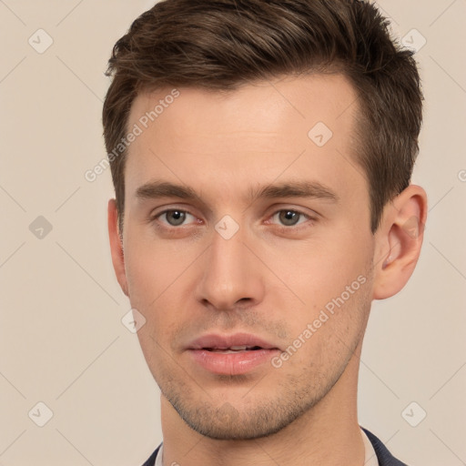 Neutral white young-adult male with short  brown hair and brown eyes