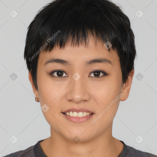 Joyful asian young-adult female with short  black hair and brown eyes