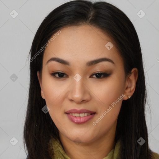 Joyful asian young-adult female with long  brown hair and brown eyes