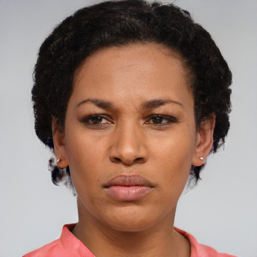 Neutral latino adult female with short  black hair and brown eyes