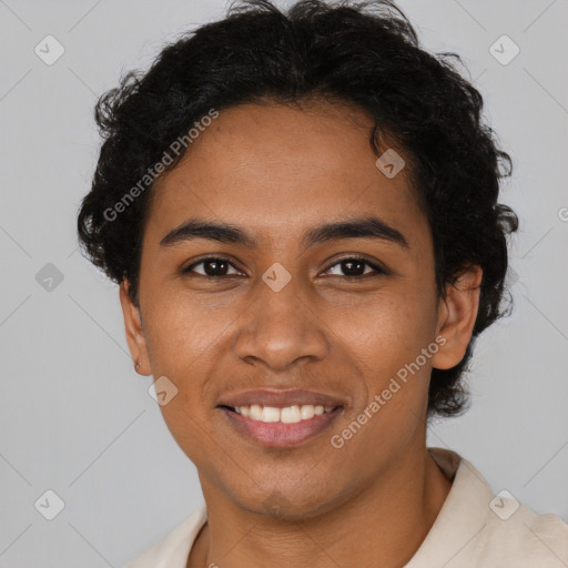 Joyful latino young-adult male with short  brown hair and brown eyes