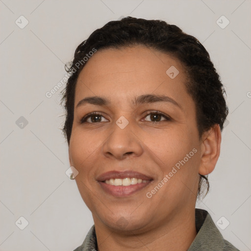 Joyful white adult female with short  brown hair and brown eyes