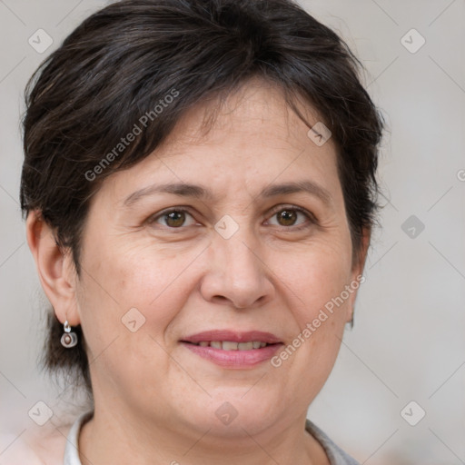 Joyful white adult female with short  brown hair and brown eyes