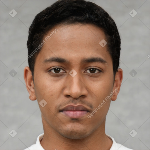 Neutral latino young-adult male with short  black hair and brown eyes