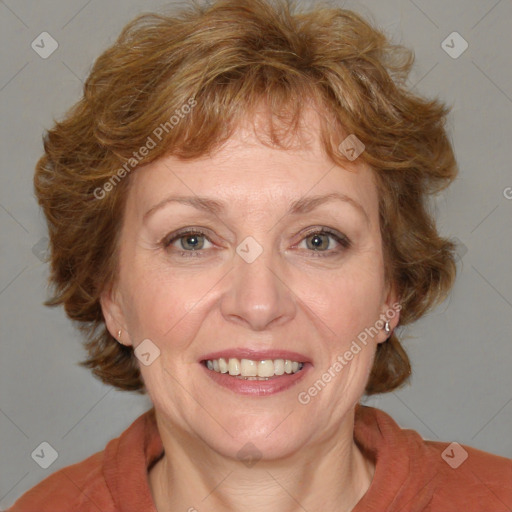 Joyful white adult female with medium  brown hair and blue eyes