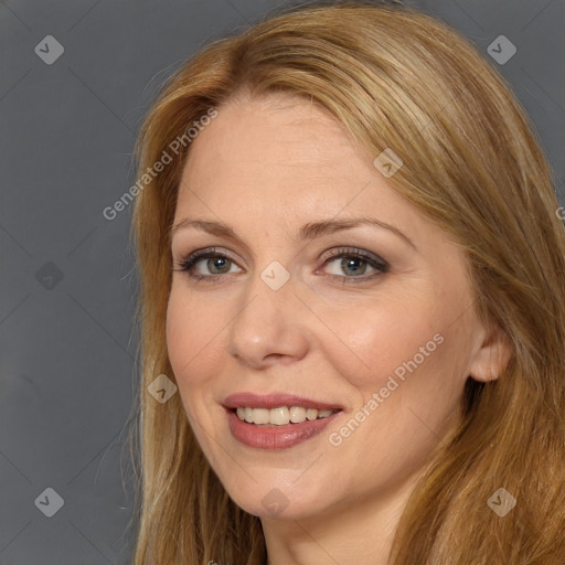 Joyful white adult female with long  brown hair and brown eyes