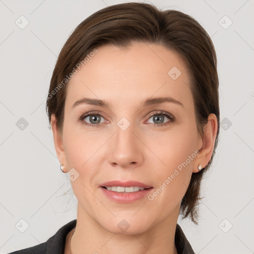 Joyful white young-adult female with medium  brown hair and grey eyes