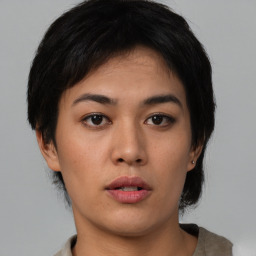 Neutral asian young-adult female with medium  brown hair and brown eyes