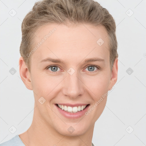 Joyful white young-adult female with short  brown hair and grey eyes