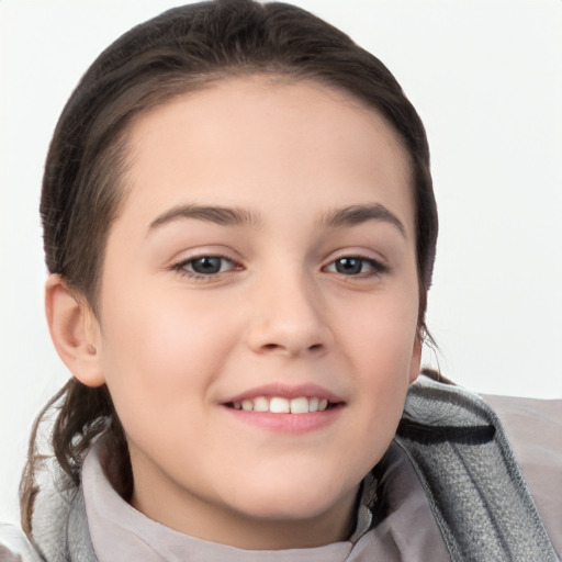 Joyful white child female with short  brown hair and brown eyes