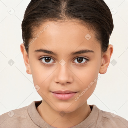 Joyful white child female with short  brown hair and brown eyes