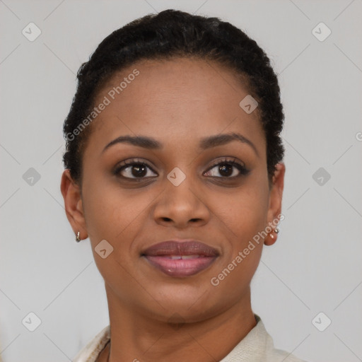 Joyful black young-adult female with short  brown hair and brown eyes