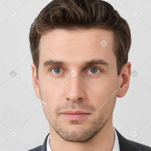 Neutral white young-adult male with short  brown hair and grey eyes