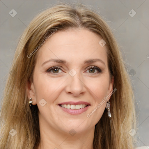 Joyful white adult female with long  brown hair and brown eyes