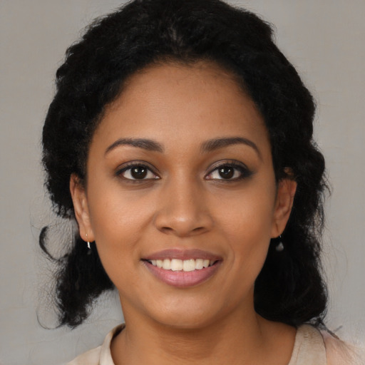 Joyful latino young-adult female with medium  black hair and brown eyes