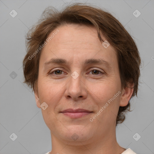 Joyful white adult female with short  brown hair and brown eyes