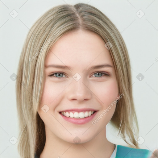 Joyful white young-adult female with long  brown hair and green eyes