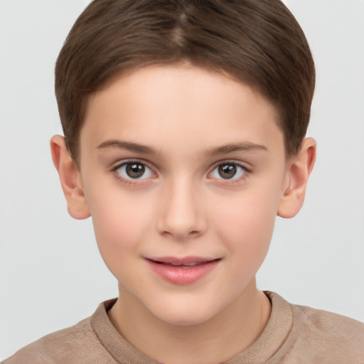 Joyful white child female with short  brown hair and brown eyes