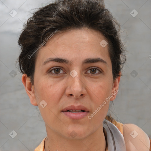 Joyful white adult female with short  brown hair and brown eyes