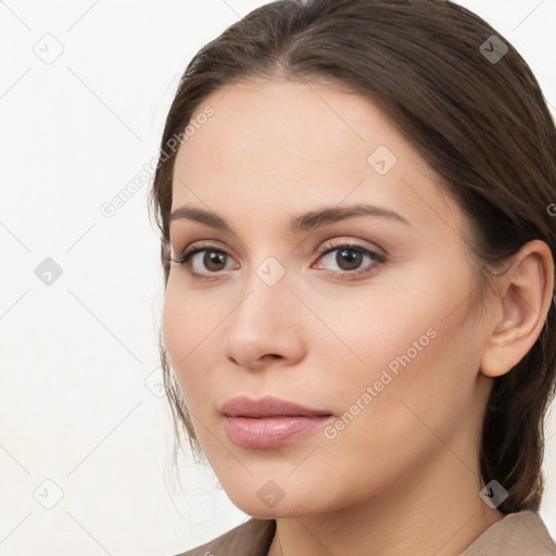 Neutral white young-adult female with long  brown hair and brown eyes