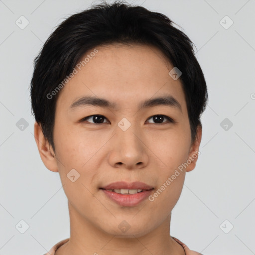 Joyful asian young-adult male with short  brown hair and brown eyes