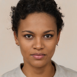 Neutral black young-adult female with short  brown hair and brown eyes