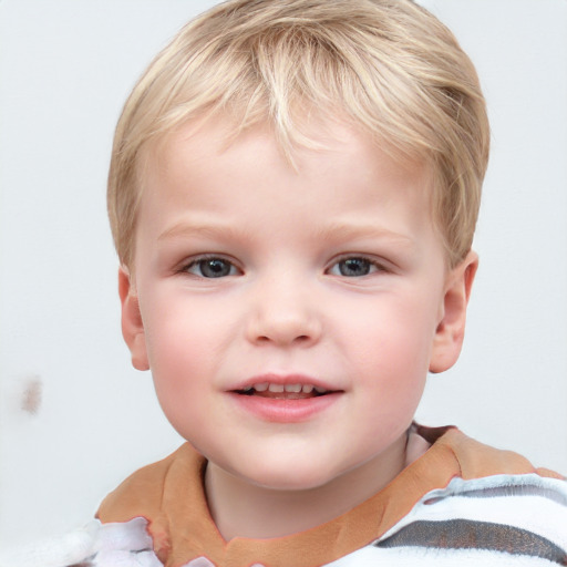 Joyful white child male with short  brown hair and blue eyes