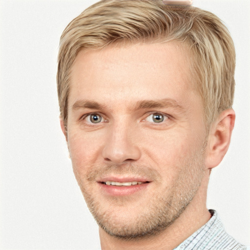 Joyful white adult male with short  brown hair and grey eyes