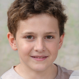 Joyful white child male with short  brown hair and brown eyes