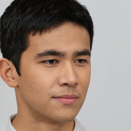 Neutral asian young-adult male with short  brown hair and brown eyes