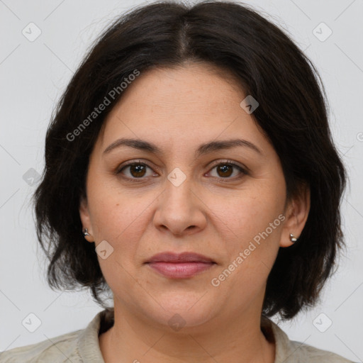 Joyful white adult female with medium  brown hair and brown eyes