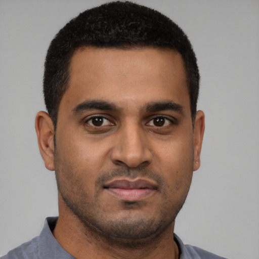 Neutral black young-adult male with short  black hair and brown eyes
