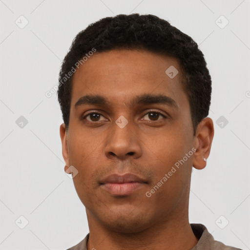 Neutral latino young-adult male with short  black hair and brown eyes