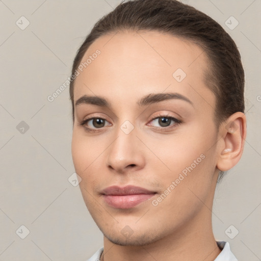 Neutral white young-adult female with short  brown hair and brown eyes