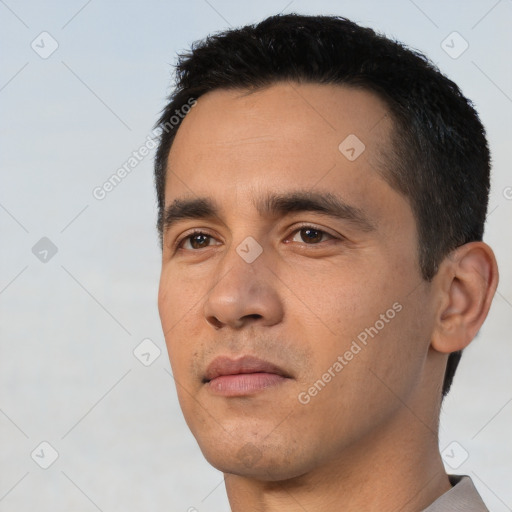 Neutral white young-adult male with short  black hair and brown eyes