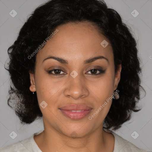 Joyful black adult female with medium  brown hair and brown eyes