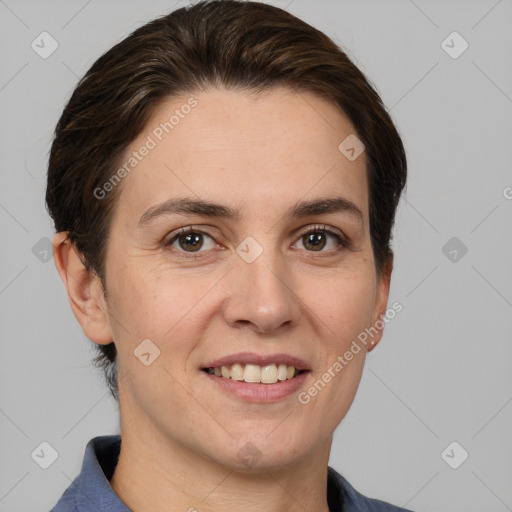 Joyful white adult female with short  brown hair and brown eyes