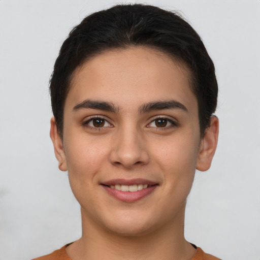 Joyful white young-adult female with short  brown hair and brown eyes