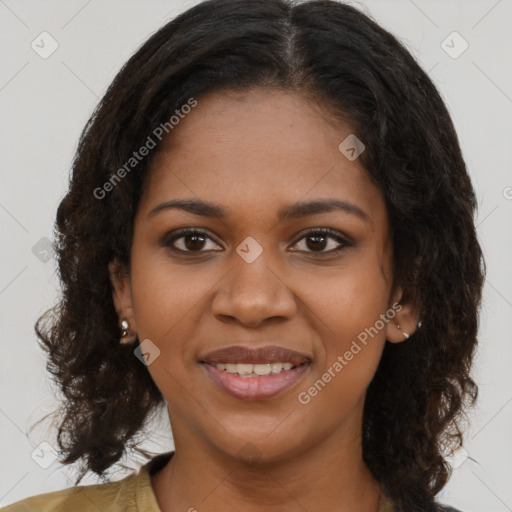 Joyful black young-adult female with medium  brown hair and brown eyes