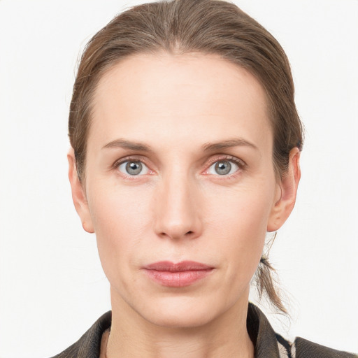 Neutral white young-adult female with long  brown hair and grey eyes