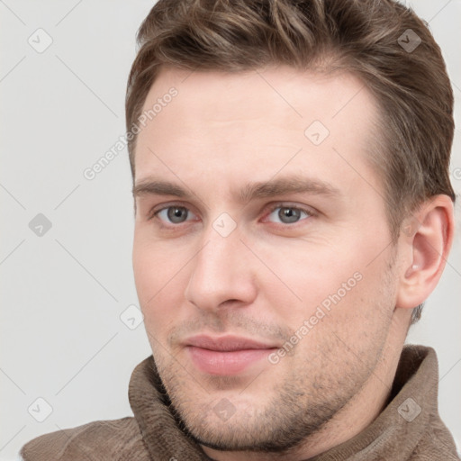 Neutral white young-adult male with short  brown hair and grey eyes