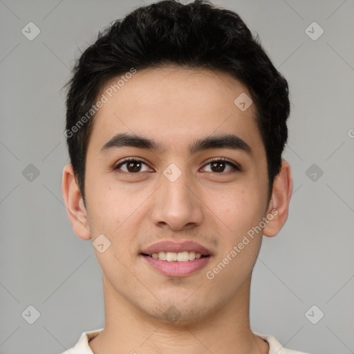 Joyful latino young-adult male with short  brown hair and brown eyes