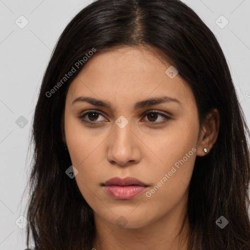 Neutral latino young-adult female with long  brown hair and brown eyes