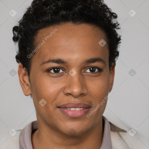 Joyful black young-adult male with short  brown hair and brown eyes