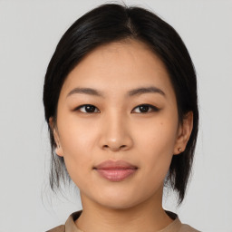 Neutral asian young-adult female with medium  black hair and brown eyes