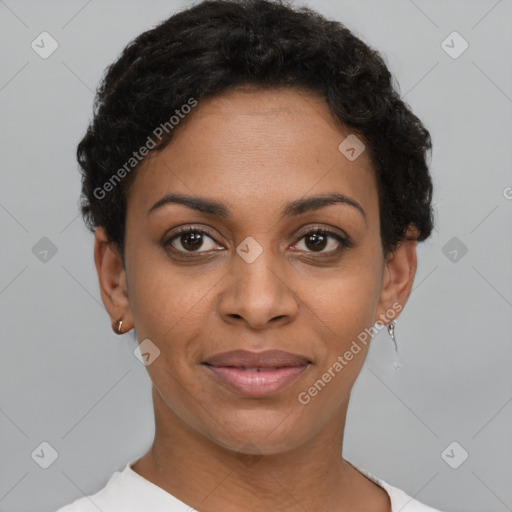 Joyful black young-adult female with short  black hair and brown eyes