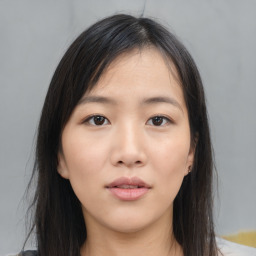 Neutral asian young-adult female with medium  brown hair and brown eyes