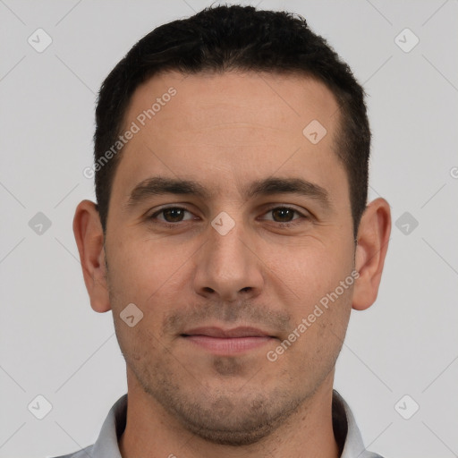 Joyful white young-adult male with short  brown hair and brown eyes